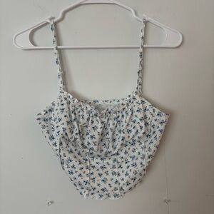 white and blue floral ruffle cropped tank top.🩵